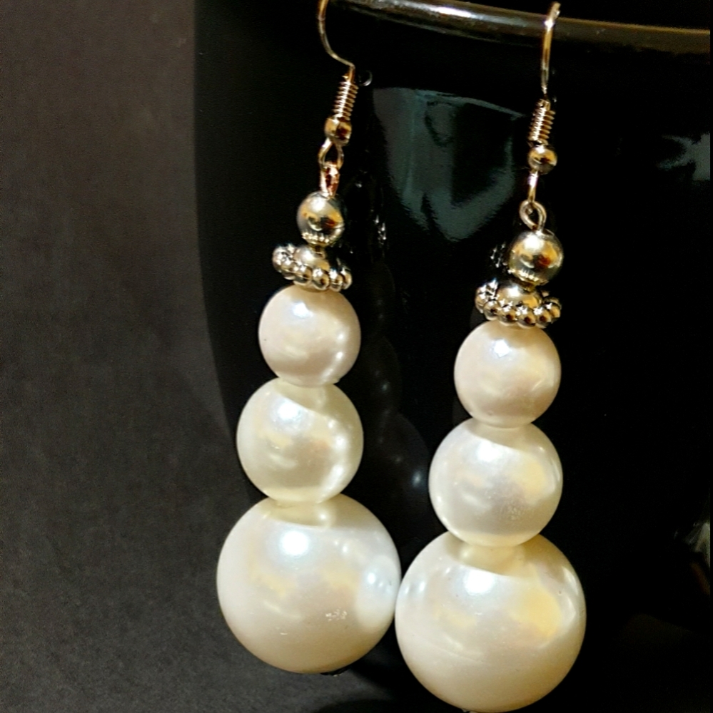 Large pearl dangling earrings